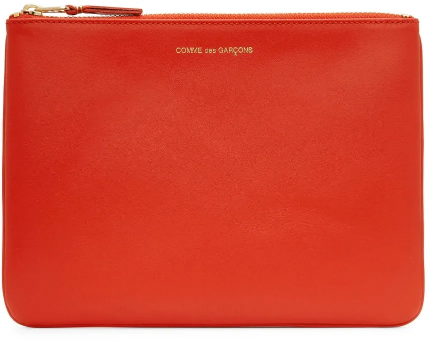COMME DES GARÇONS CLASSIC POUCH orange