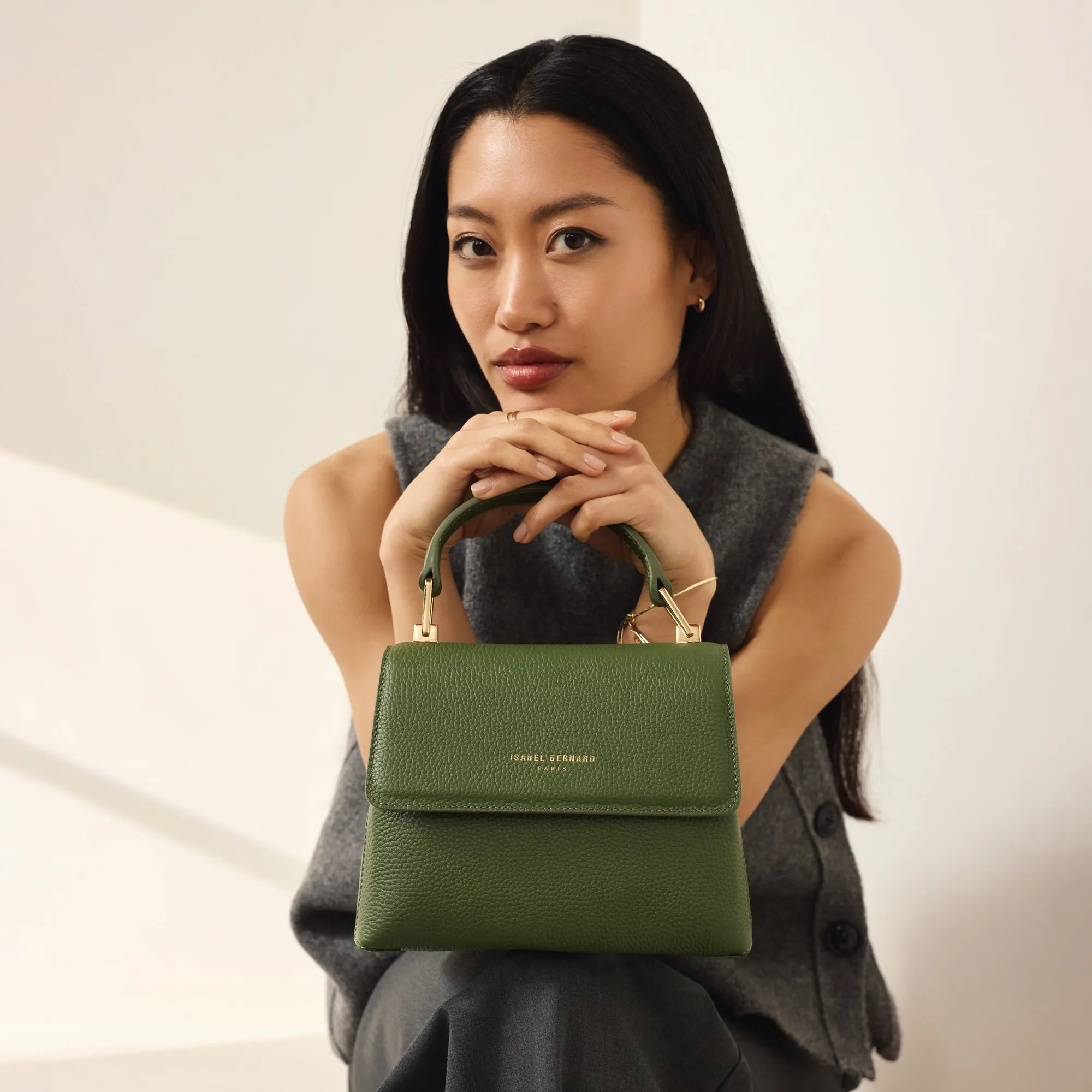 Femme Forte Heline green calfskin leather handbag