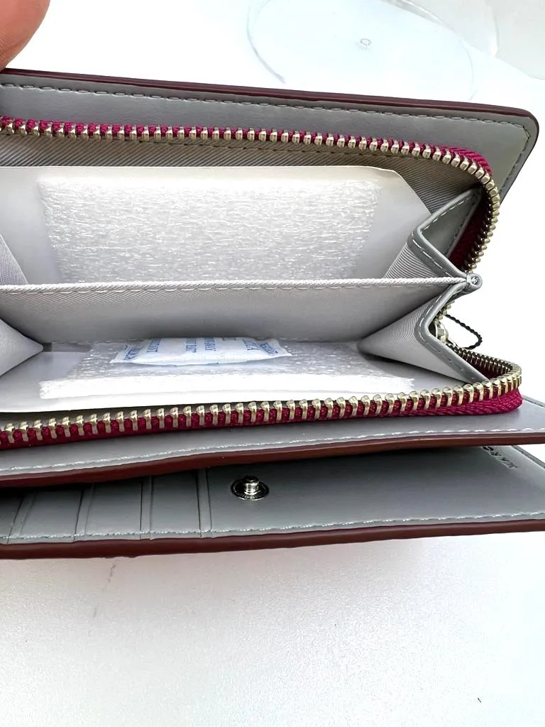 MARC JACOBS LEATHER ZIP BIFOLD WALLET